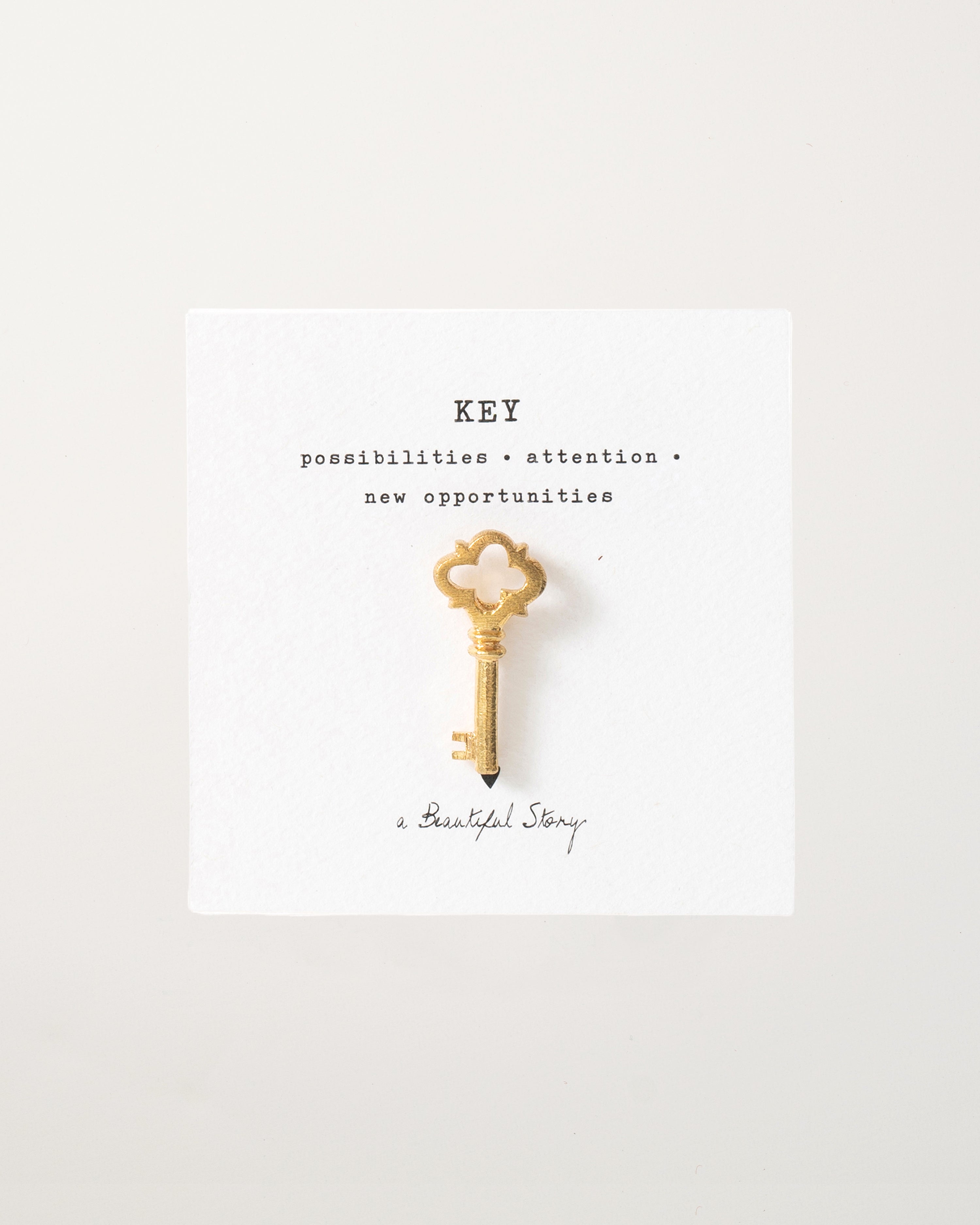Gold Brooch Key