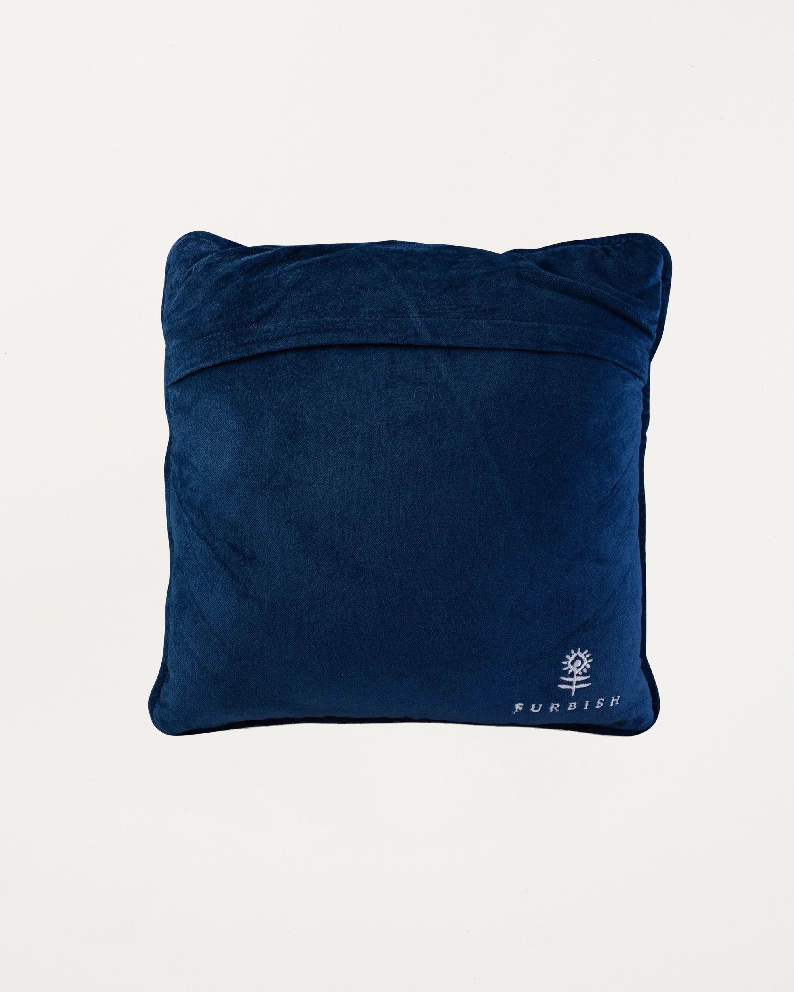 Blue pillow back with a brand logo on a light gray background