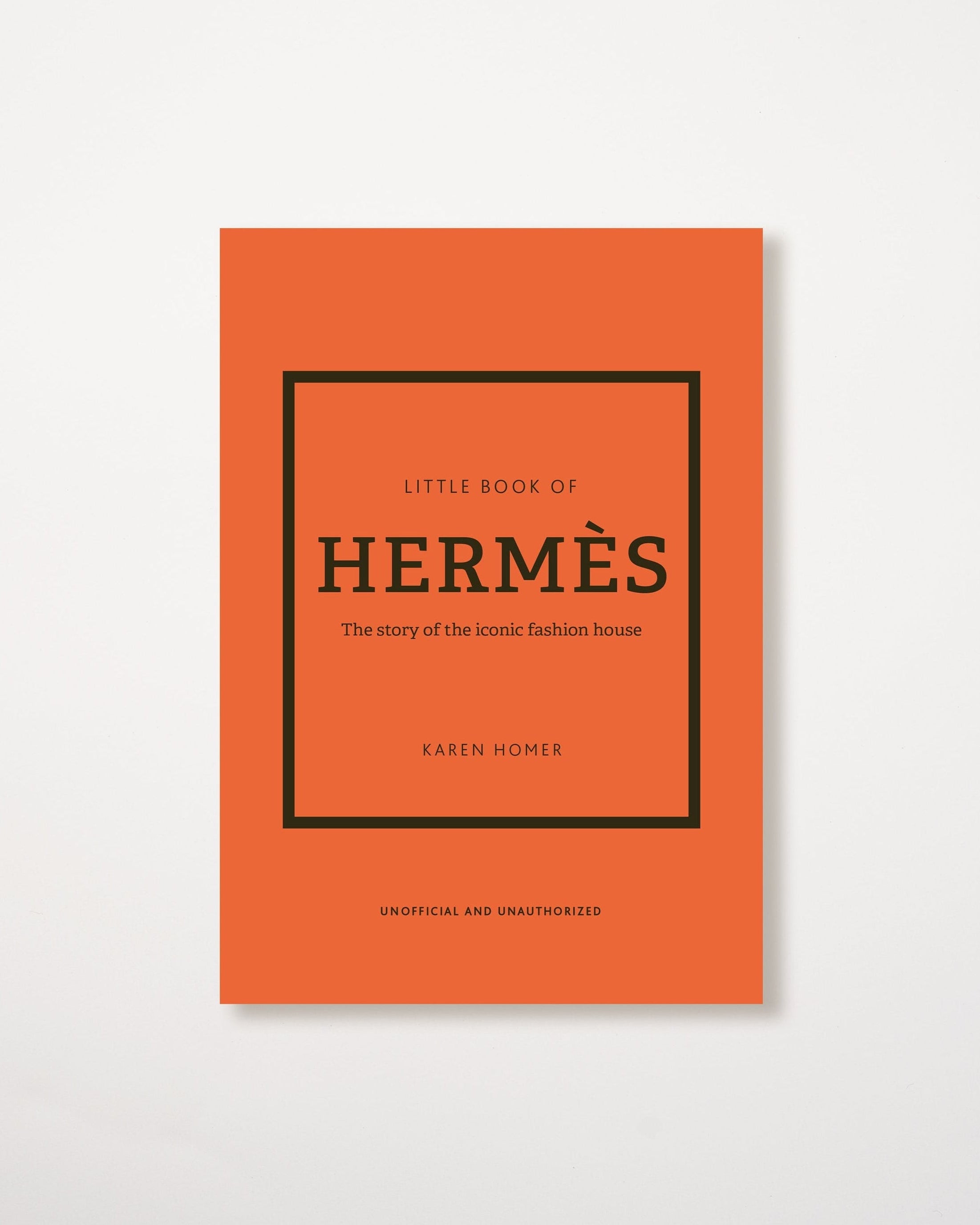 A book cover with an orange background, titled 'LITTLE BOOK OF HERMES', with a black frame and text.