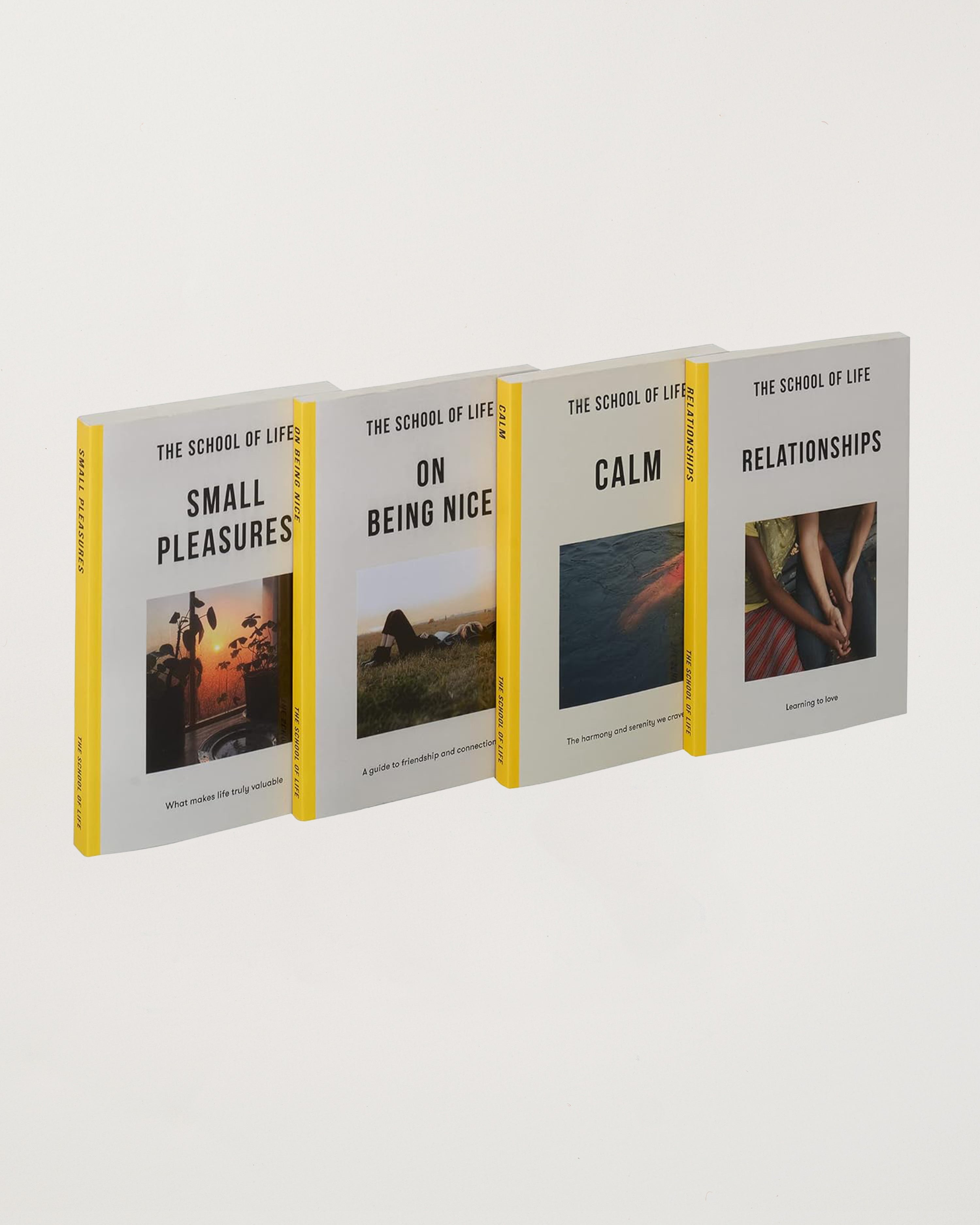Four books from 'The School of Life' series on a white background