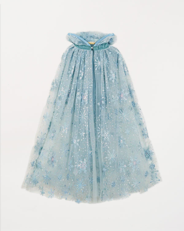Light blue tulle dress with floral embroidery on a white background
